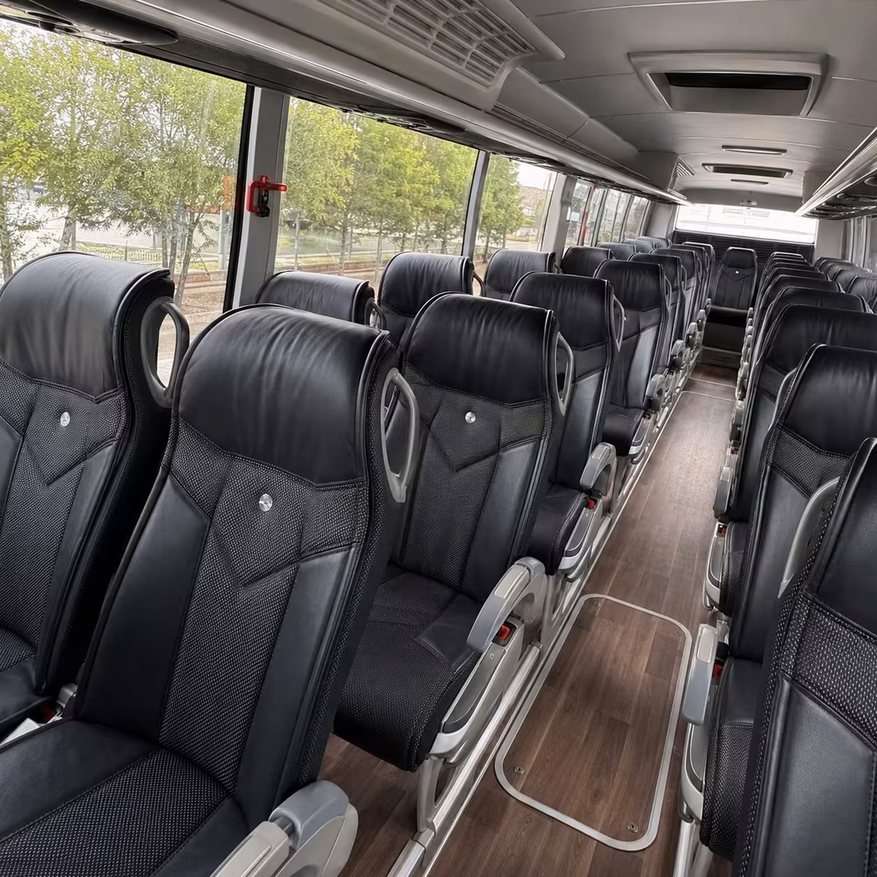 detroit airport charter bus rentals for traveling employees